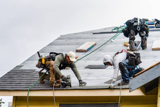 Professional Gutter Installation technician working in Bible School Park, NY